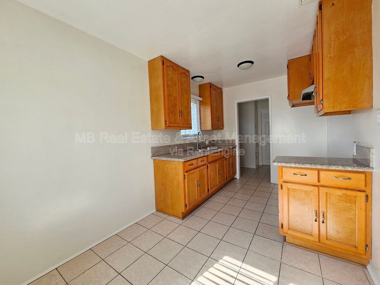 10619 Crenshaw Blvd #5 - Photo 5 of 13