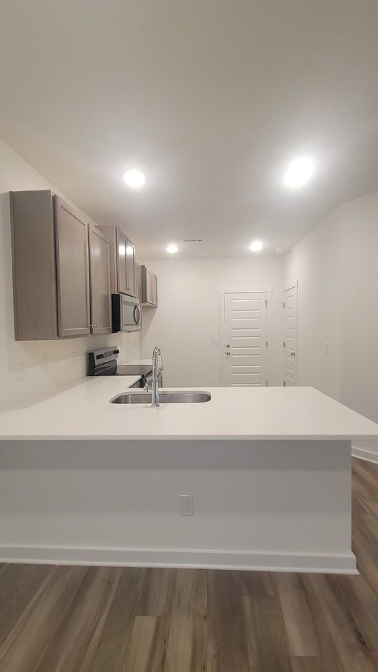 7597 Discovery Point Dr Nw - Photo 5 of 37