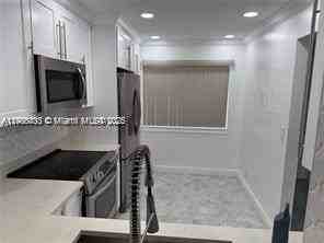 3571 Inverrary Dr #403 - Photo 6 of 9