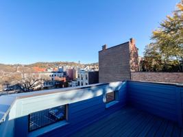 featured image of 120 E 14th St