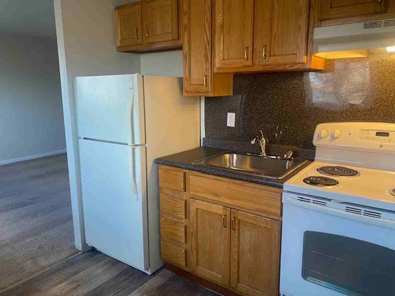 HOLLY GARDEN APARTMENTS - Photo 2 of 16