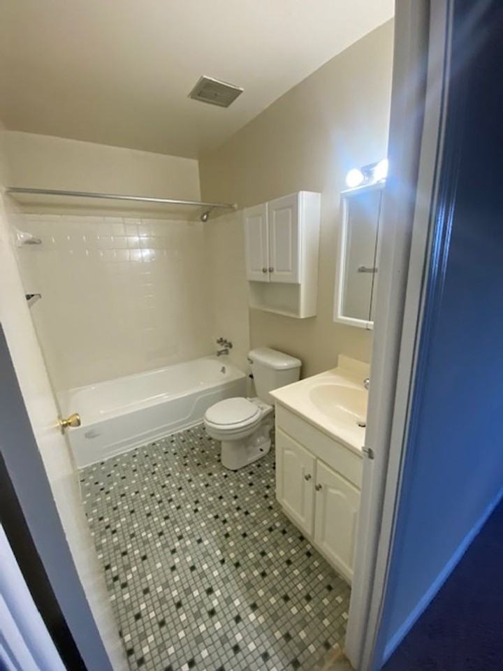 HOLLY GARDEN APARTMENTS - Photo 6 of 16