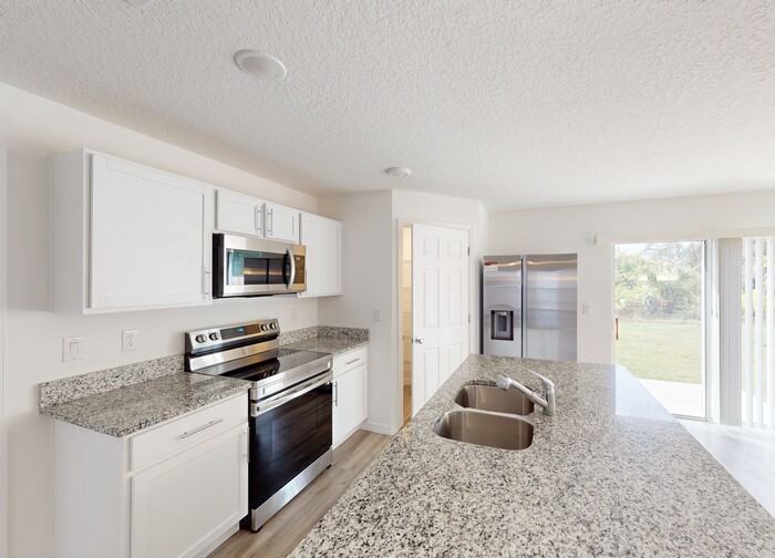 3238 Jupiter Boulevard Southeast - Photo 3 of 9