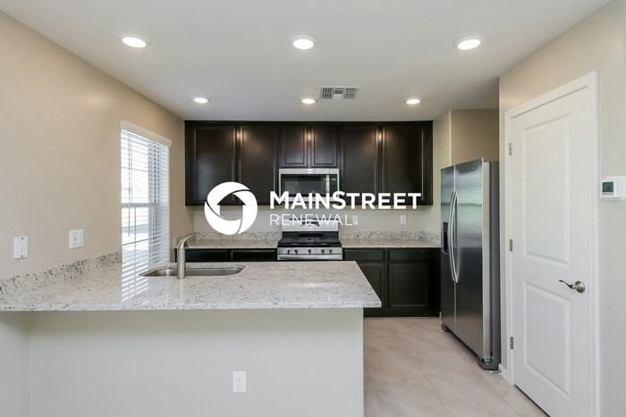 8227 W Odeum Ln - Photo 6 of 17