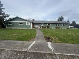 featured image of 209 E 3rd St