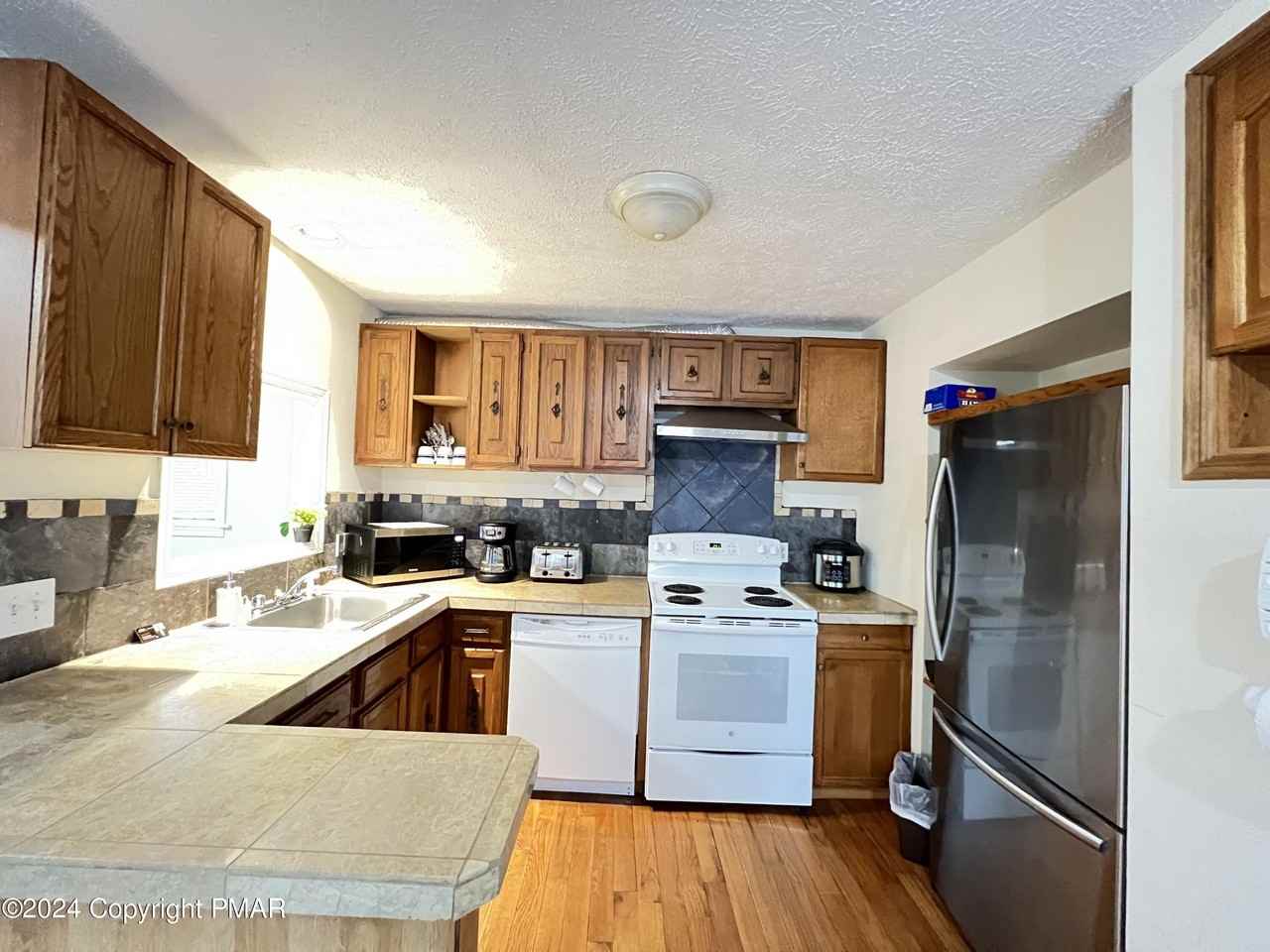 9424 Juniper Dr - Photo 2 of 33