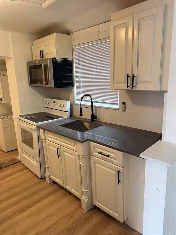 748 Nw 77th Ter - Photo 2 of 3