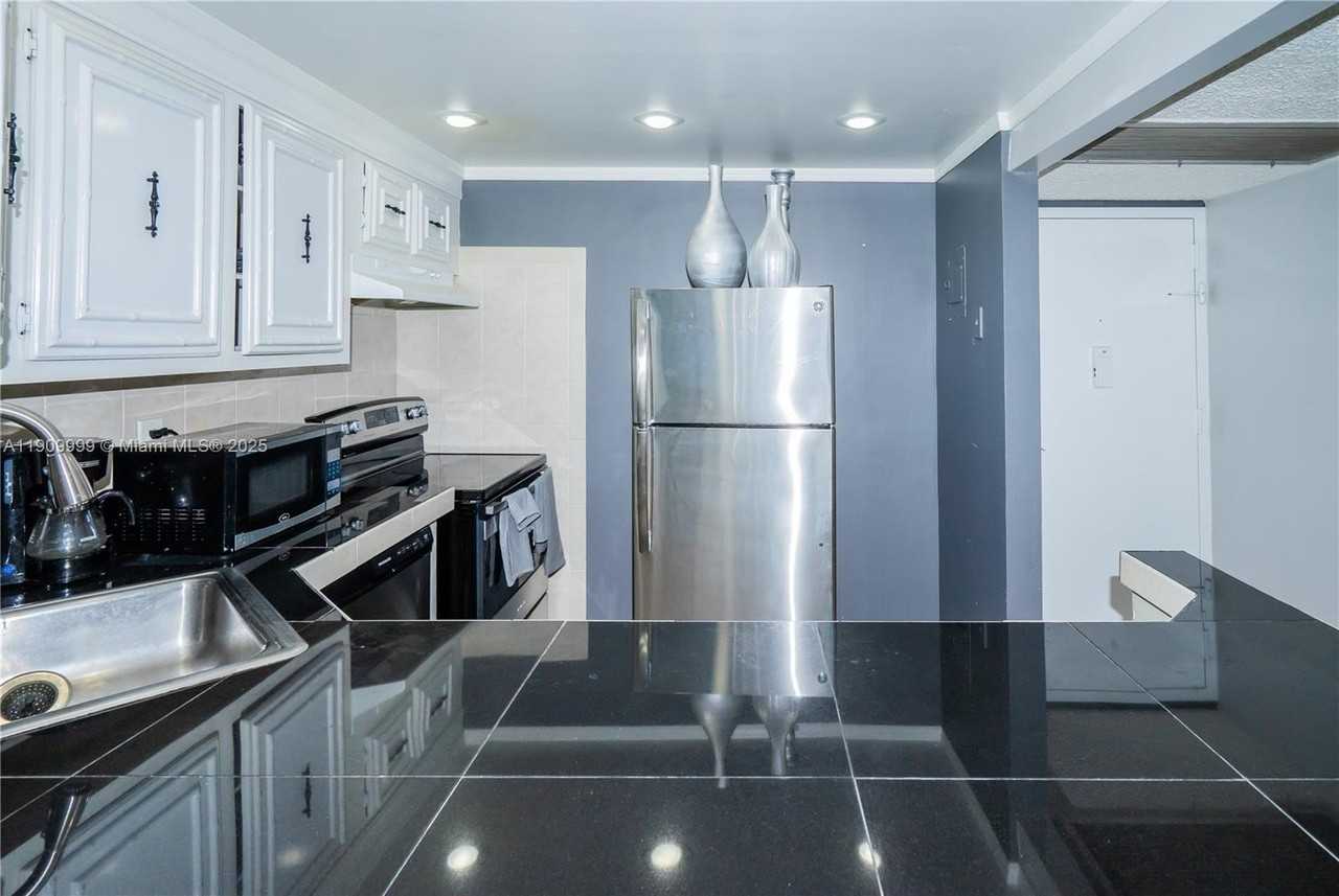 501 Three Islands Blvd #517 - Photo 6 of 22