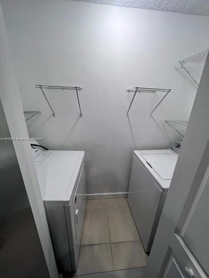 933 Ne 199th St #104 - Photo 4 of 7