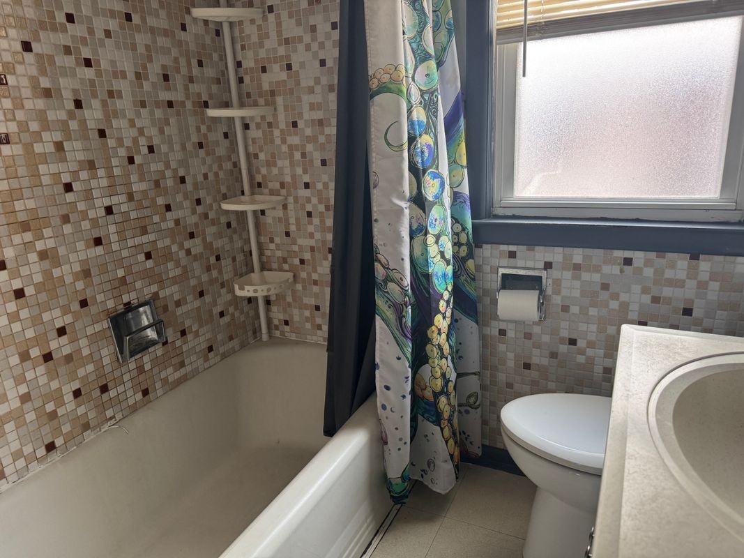 6177 Hereford St - Photo 3 of 4