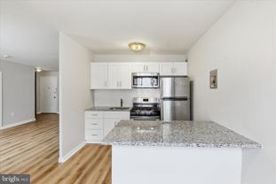 1200 South Arlington Ridge Road #717 - Photo 1 of 1