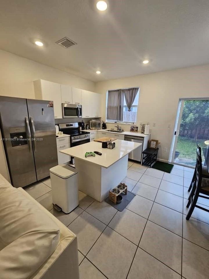 12108 Northwest 24th Avenue #0 - Photo 4 of 18