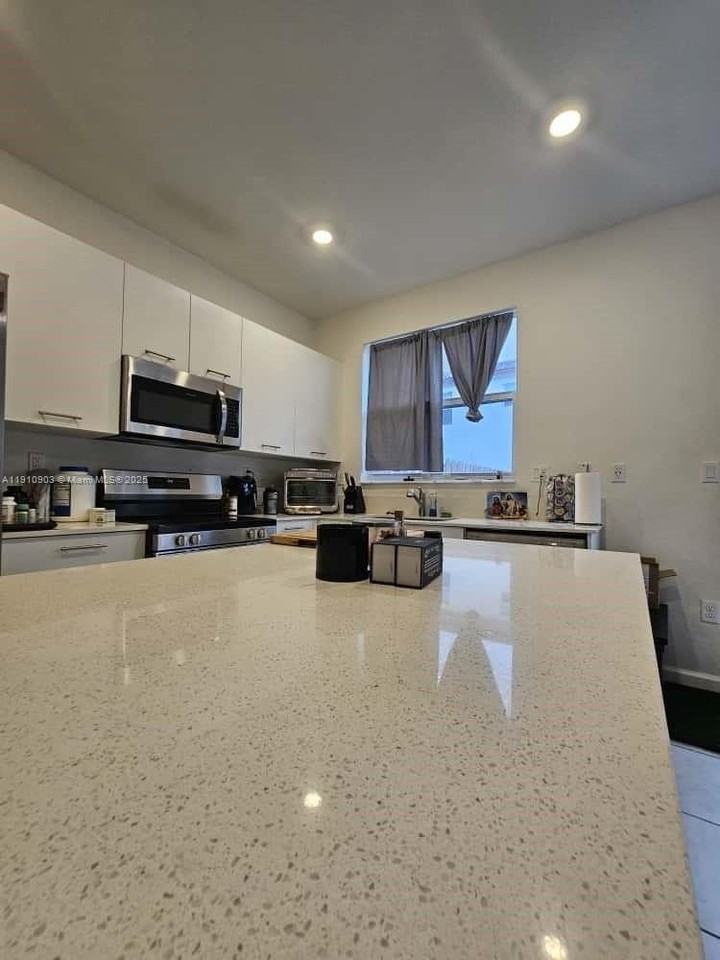 12108 Northwest 24th Avenue #0 - Photo 5 of 18