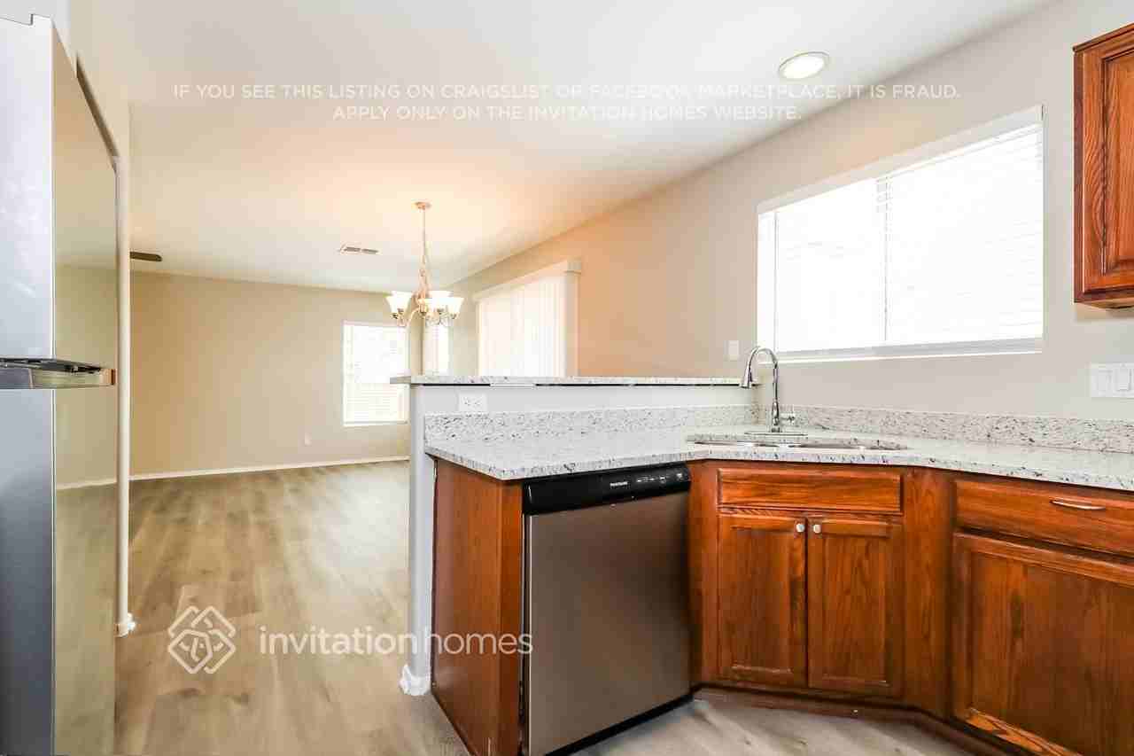 718 South 223rd Drive - Photo 5 of 14