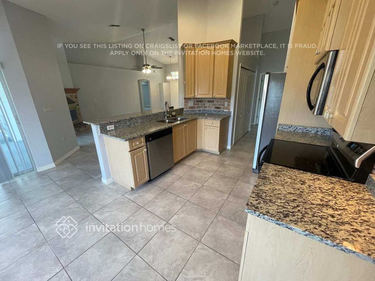 23259 Mulligan Ave - Photo 5 of 16