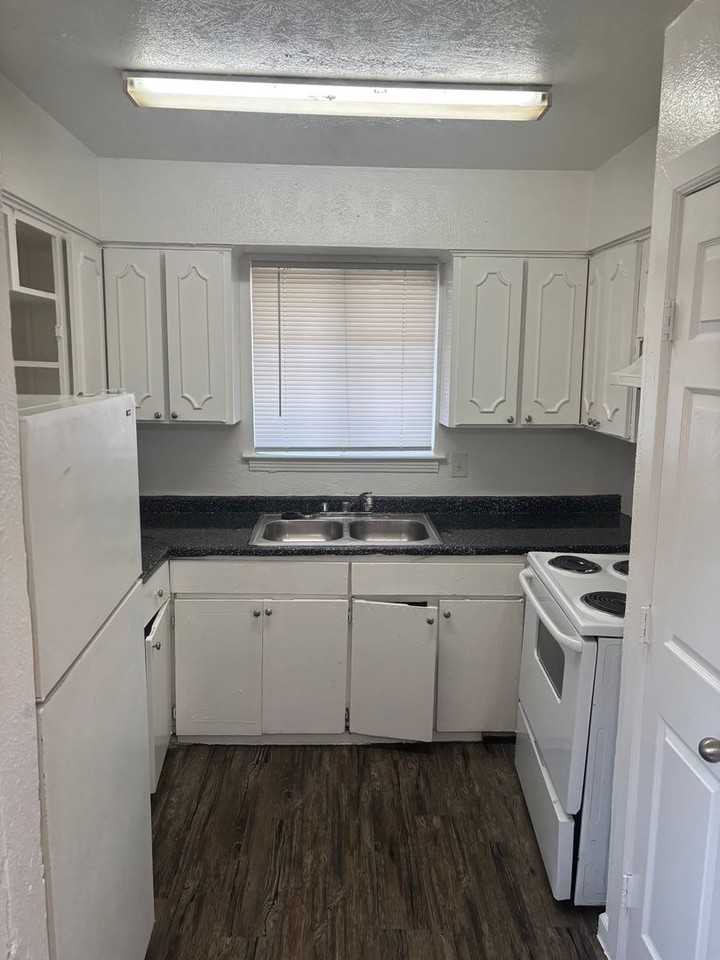 Spanish Stone Apartments - Photo 2 of 14