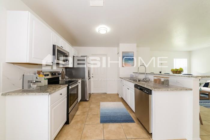 601 27th Ave W - Photo 2 of 18