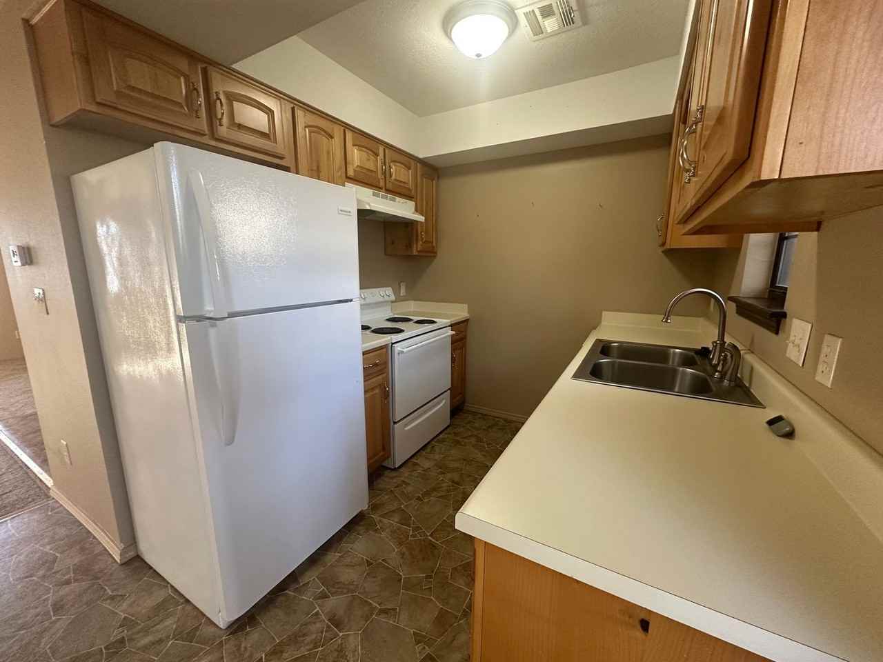 1107 S Saint Louis Ave - Photo 4 of 12