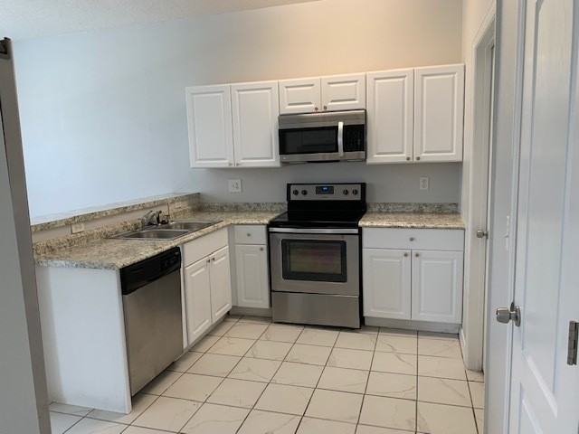1803 Royal Ridge Dr - Photo 2 of 27