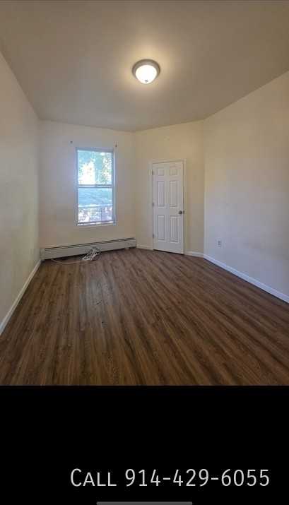 296 Woodworth Ave - Photo 6 of 11