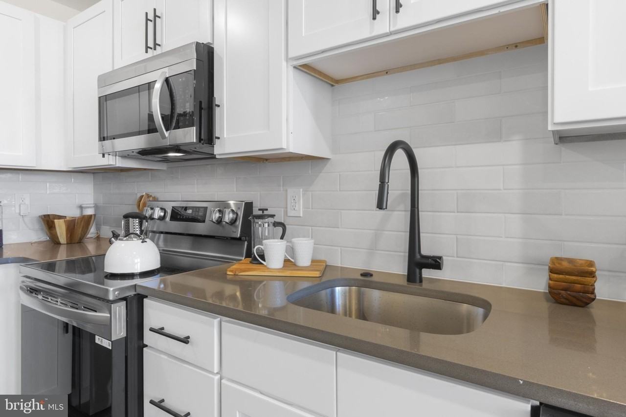 7037 Ridge Ave Apt 105 #105 - Photo 6 of 19