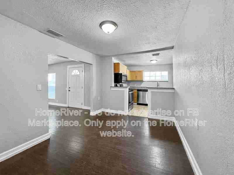 1410 E Waters Ave - Photo 2 of 19