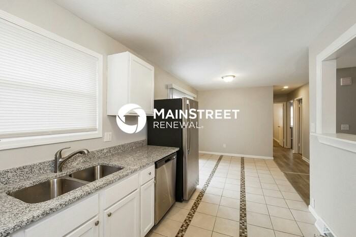 6302 East 140th Terrace - Photo 7 of 17