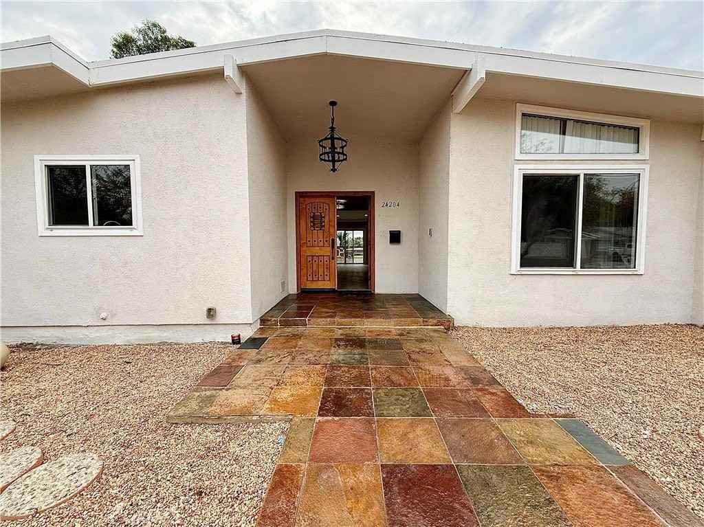 24204 Calvert St - Photo 2 of 50