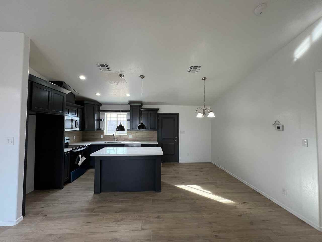 10673 E 46th Ln - Photo 5 of 23