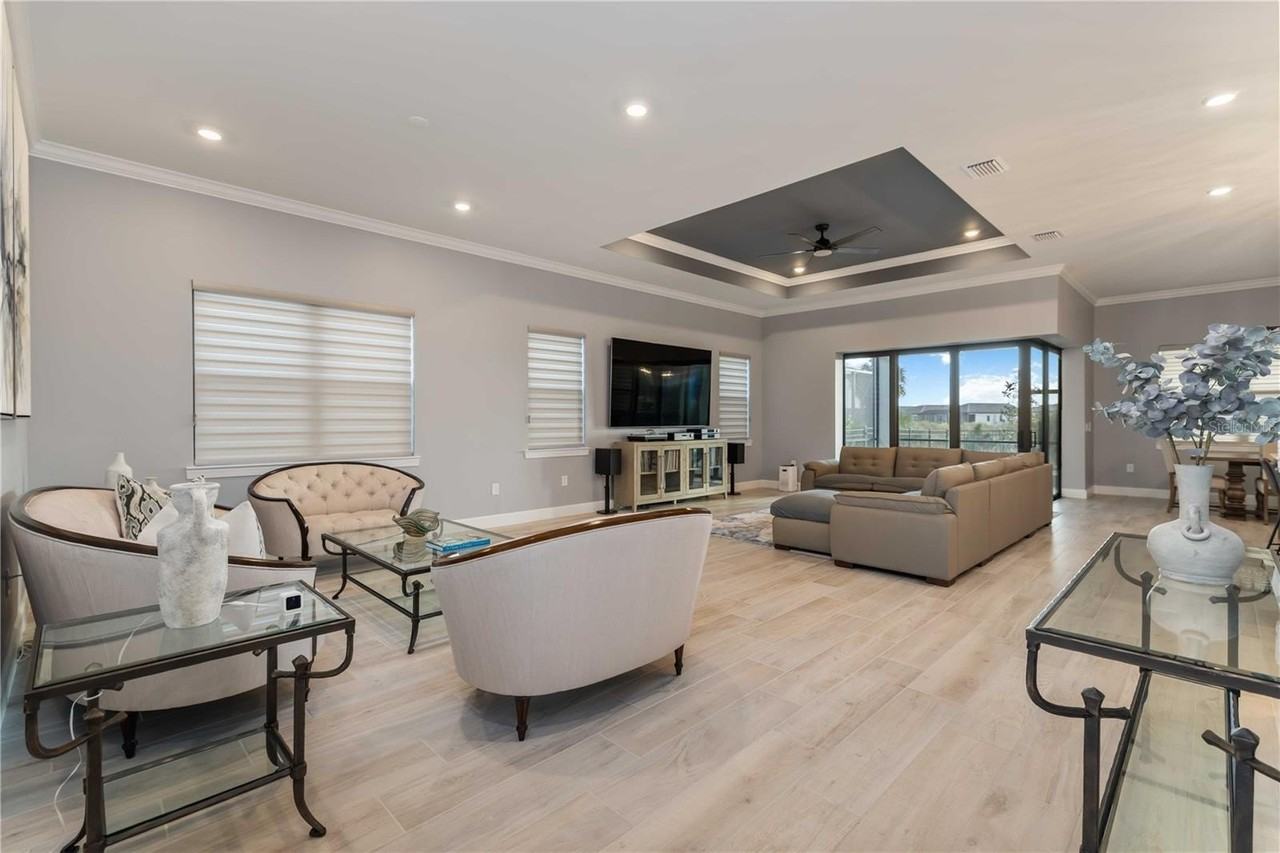 6075 Sawgrass Lake Ct - Photo 2 of 50