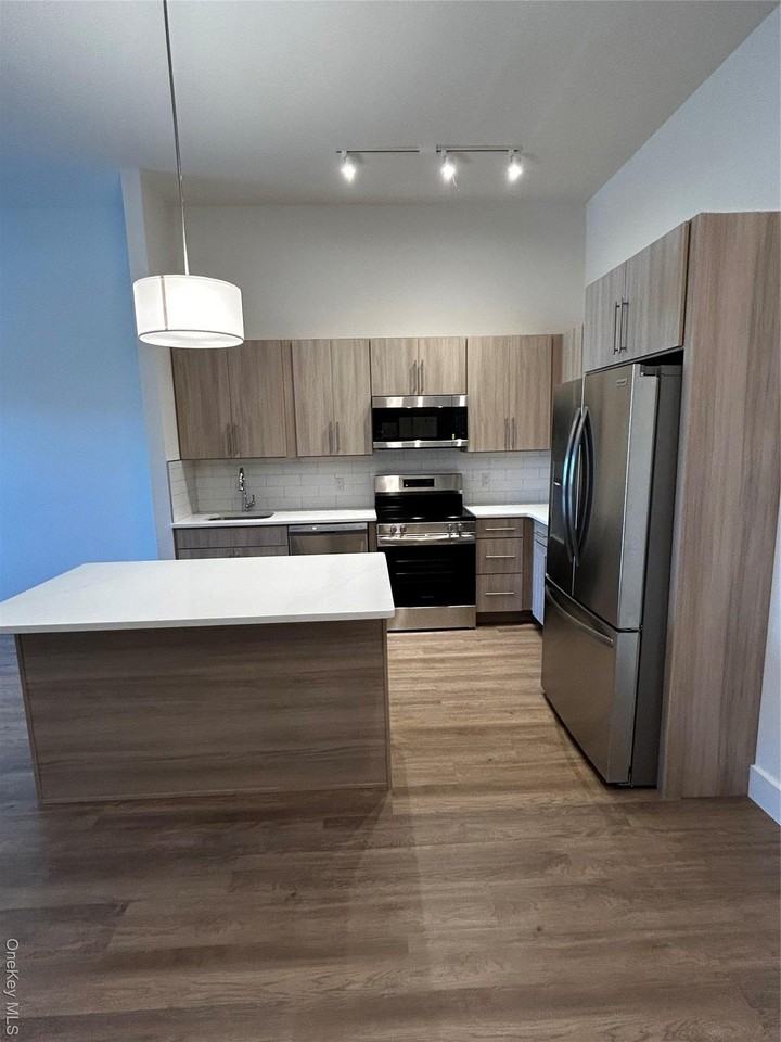 4180 Sunrise Highway - Photo 3 of 12