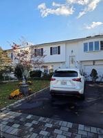 featured image of 127 E 12th St