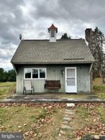 featured image of 8702 SCHOOL HOUSE Lane unit: Cottage