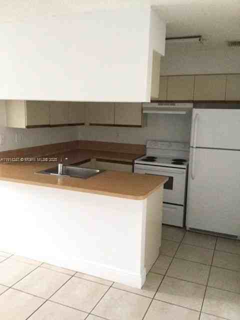 17580 Northwest 67th Place #F1 - Photo 2 of 14