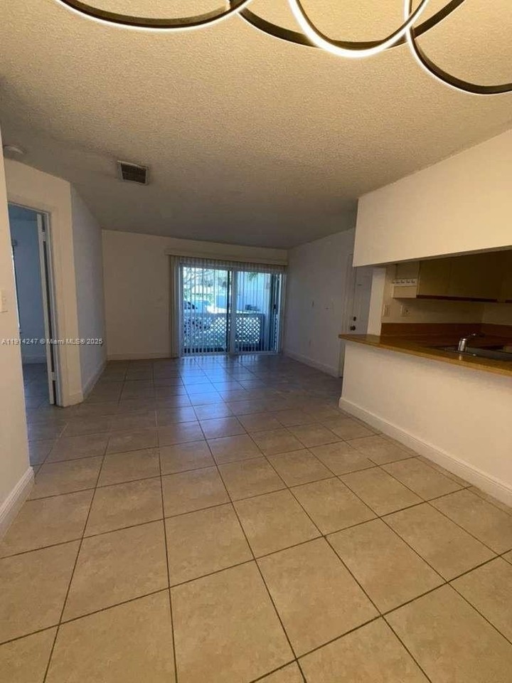 17580 Northwest 67th Place #F1 - Photo 3 of 14