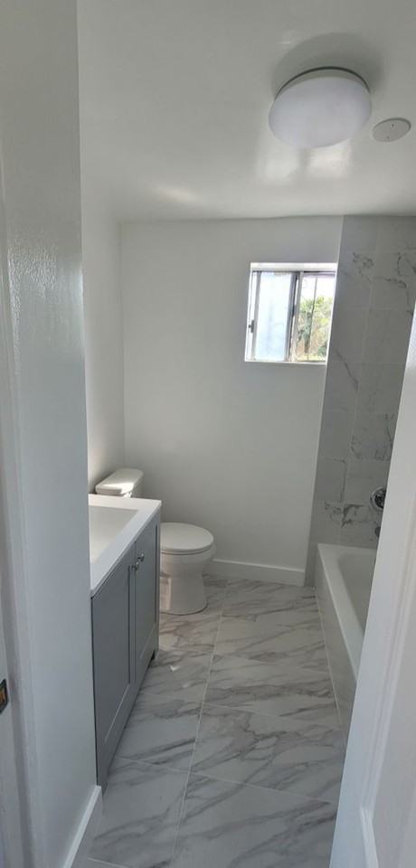 352 E 52nd St - Photo 2 of 3