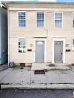 featured image of 117 1/2 Fulton St