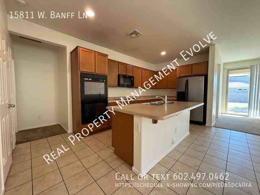 15811 W Banff Ln - Photo 5 of 36