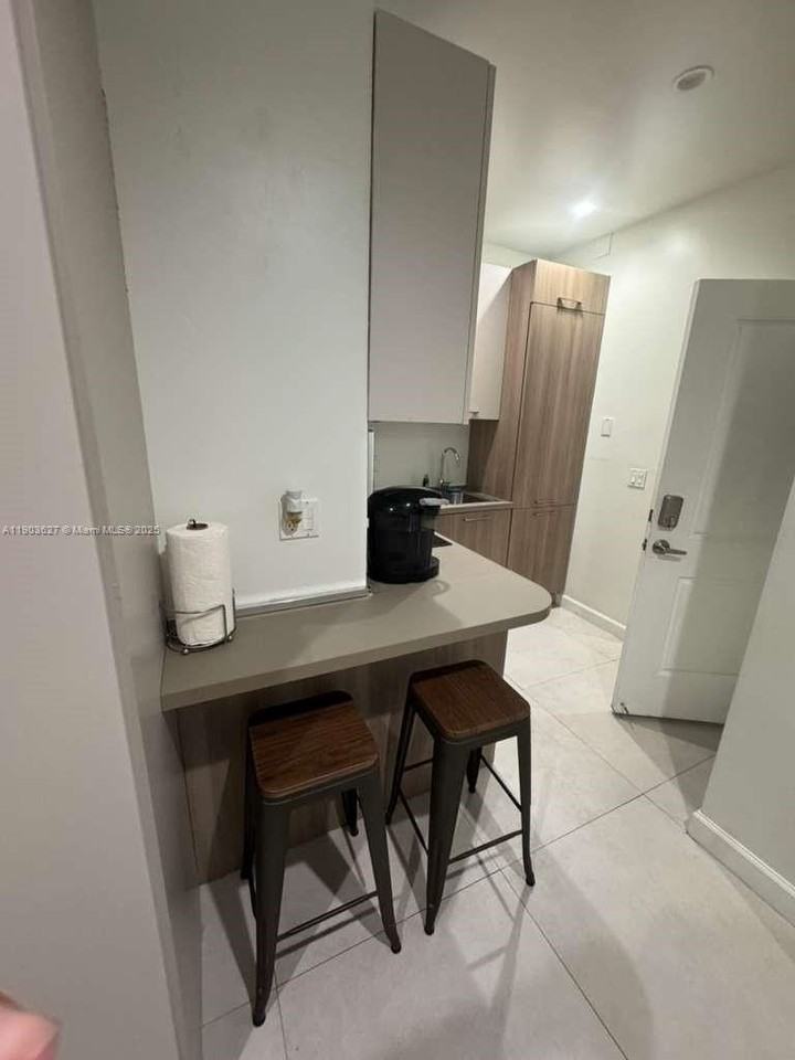 245 Ne 33rd St #106 - Photo 4 of 13