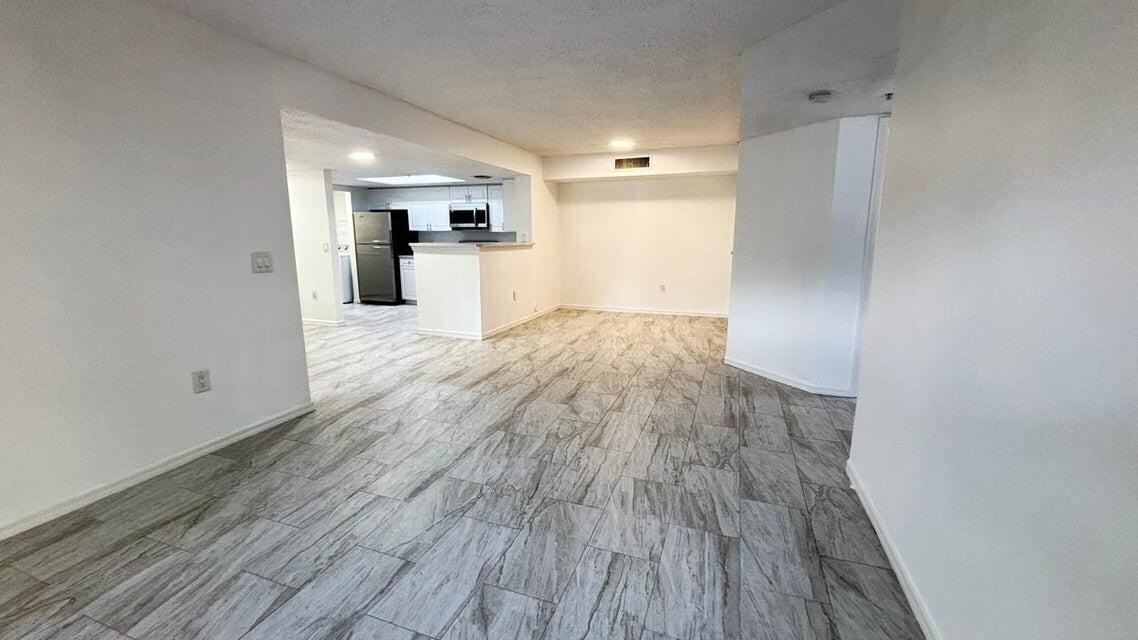 5025 Wiles Rd #107 - Photo 2 of 30