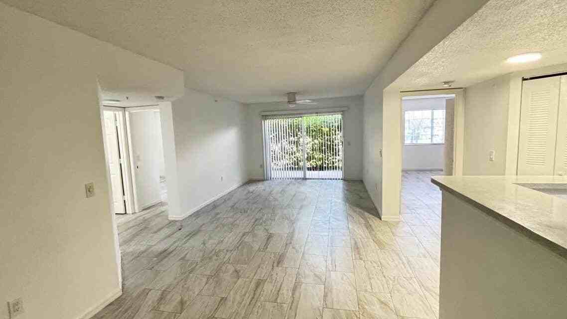 5025 Wiles Rd #107 - Photo 5 of 30