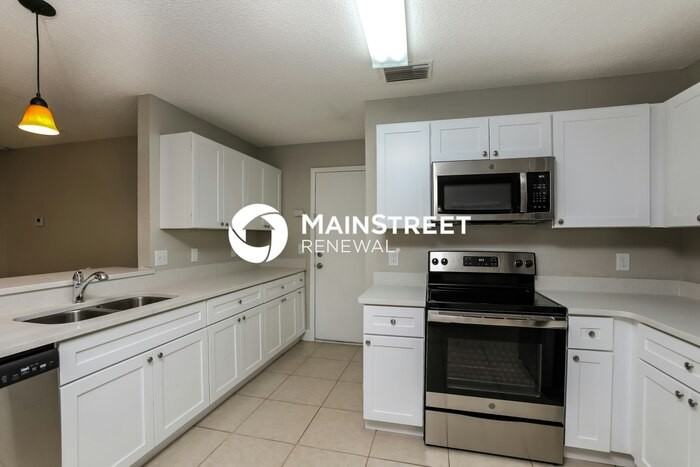 10729 Satinwood Cir - Photo 5 of 17