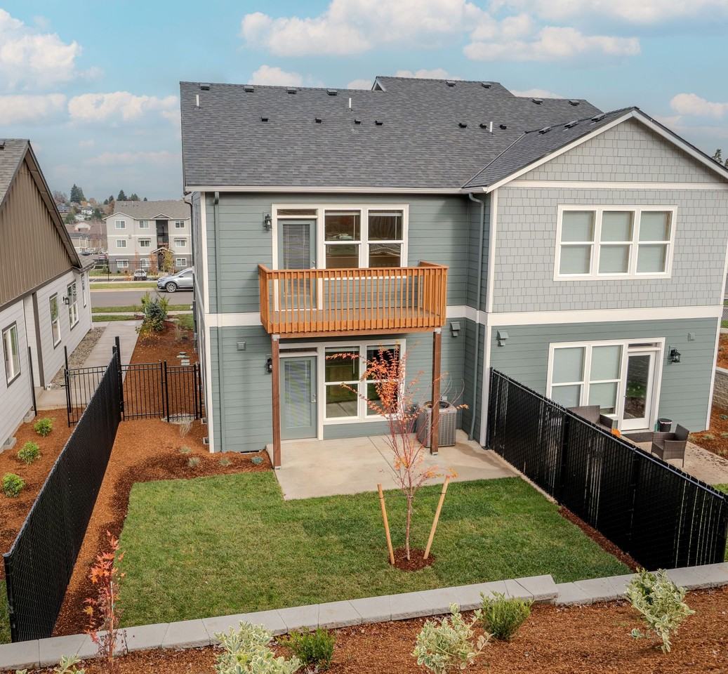 LIBERTY CREST TOWNHOMES - Photo 2 of 13