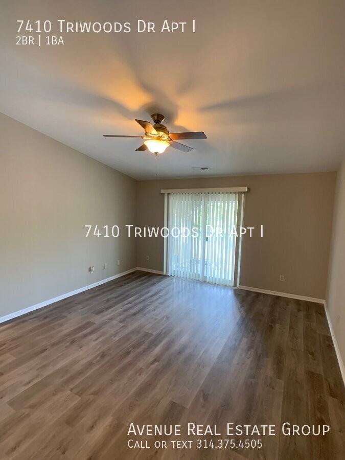 7410 Triwoods Dr Apt I - Photo 2 of 14