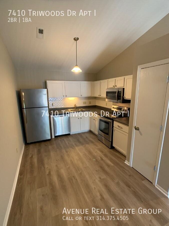7410 Triwoods Dr Apt I - Photo 3 of 14