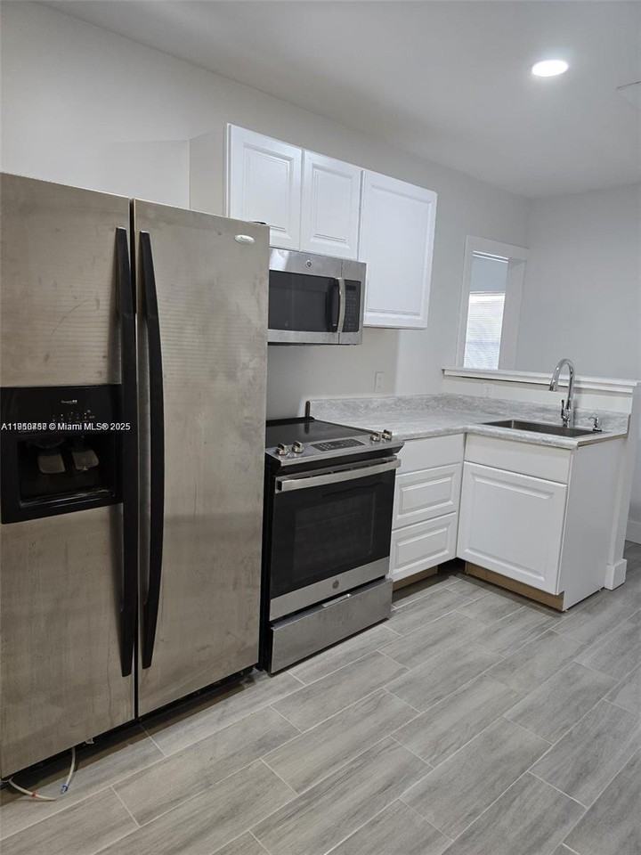 1245 Ne 110th Ter #2 - Photo 2 of 7