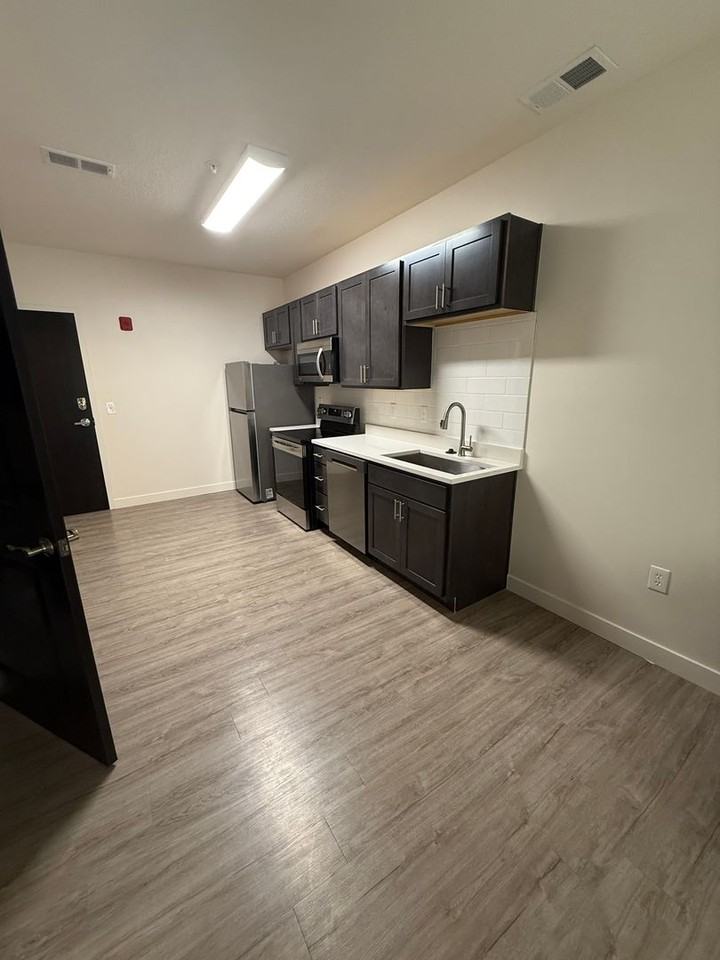 MONTEREY APARTMENTS - Photo 6 of 15