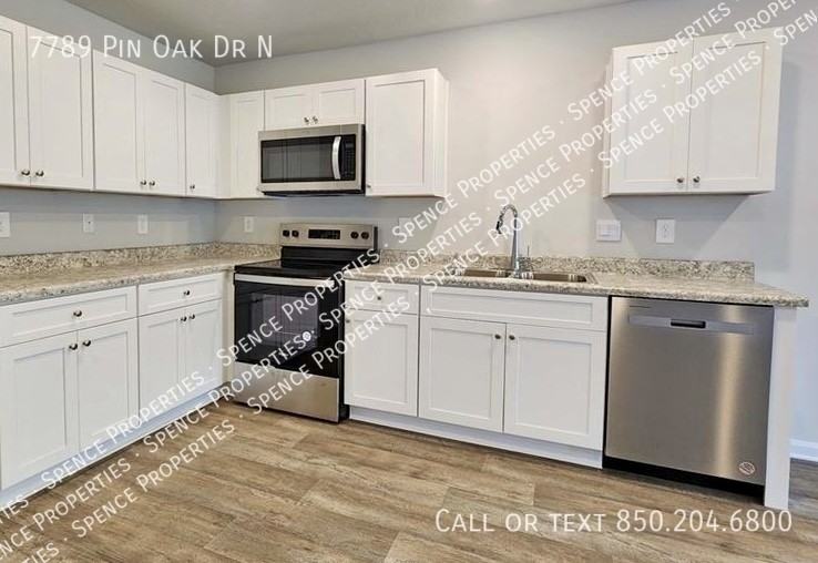 7789 7789 Pin Oak Dr N - Photo 2 of 6