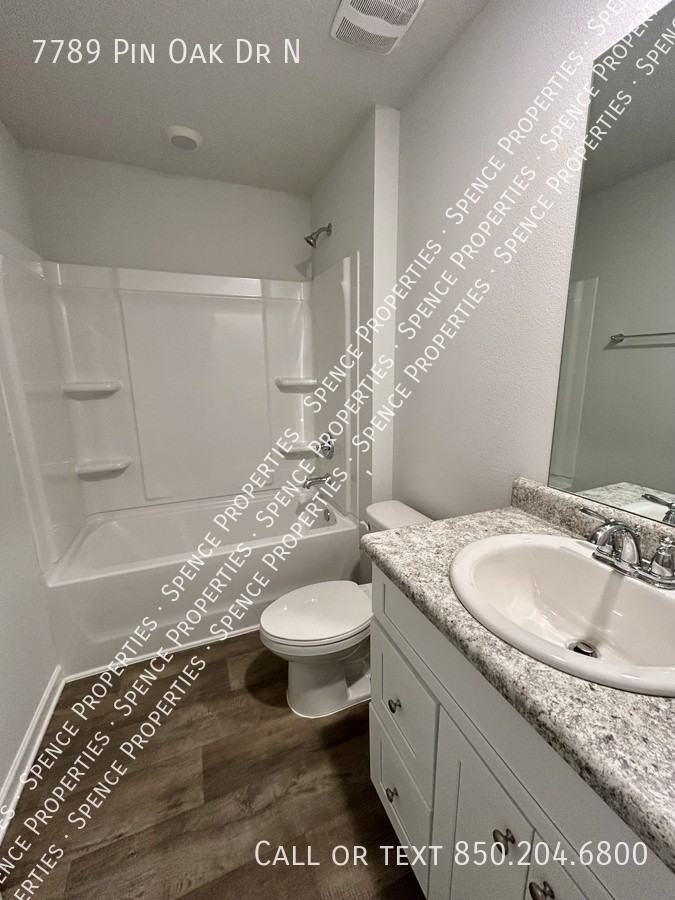 7789 7789 Pin Oak Dr N - Photo 3 of 6