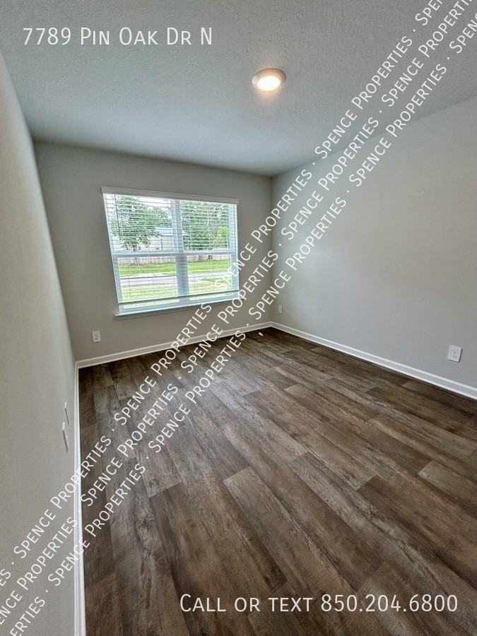 7789 7789 Pin Oak Dr N - Photo 4 of 6